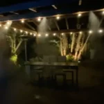 Outdoor patio with decorative string lights at night
