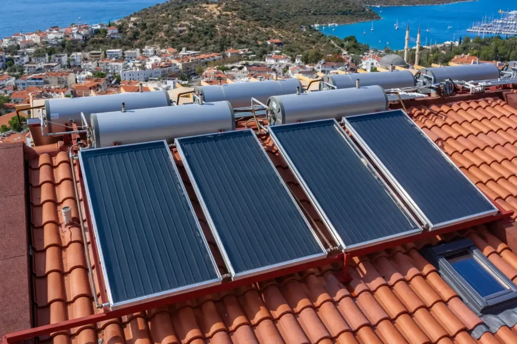 Solar water heating panels installed on a residential tile roof